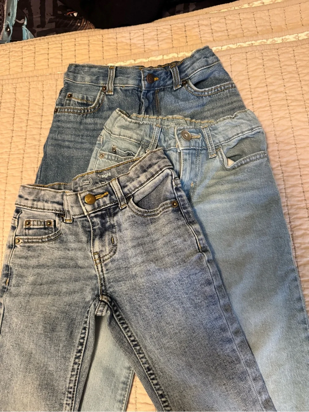 Three pair of Light and Medium Blue Denim Jeans